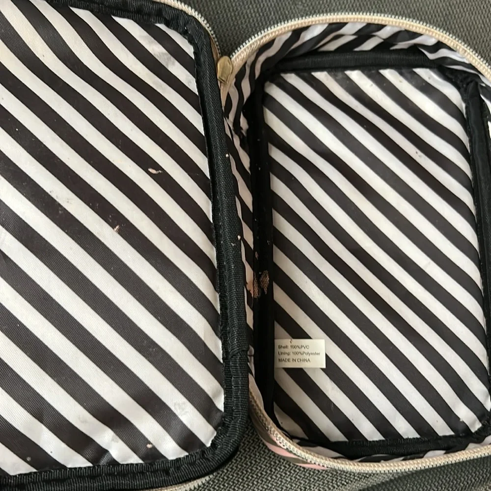 Too Faced Gold and Pink Makeup Bag “I have way more makeup at home”